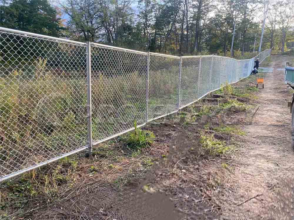 Backyard framed chain link barriers